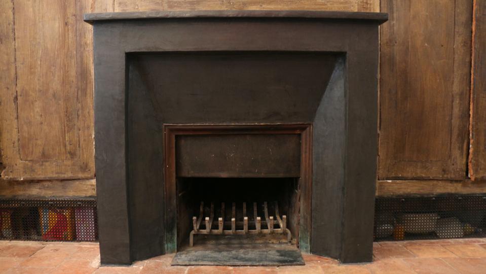 Cheminée de vieille demeure rénovée grâce à l'enduit en béton ciré